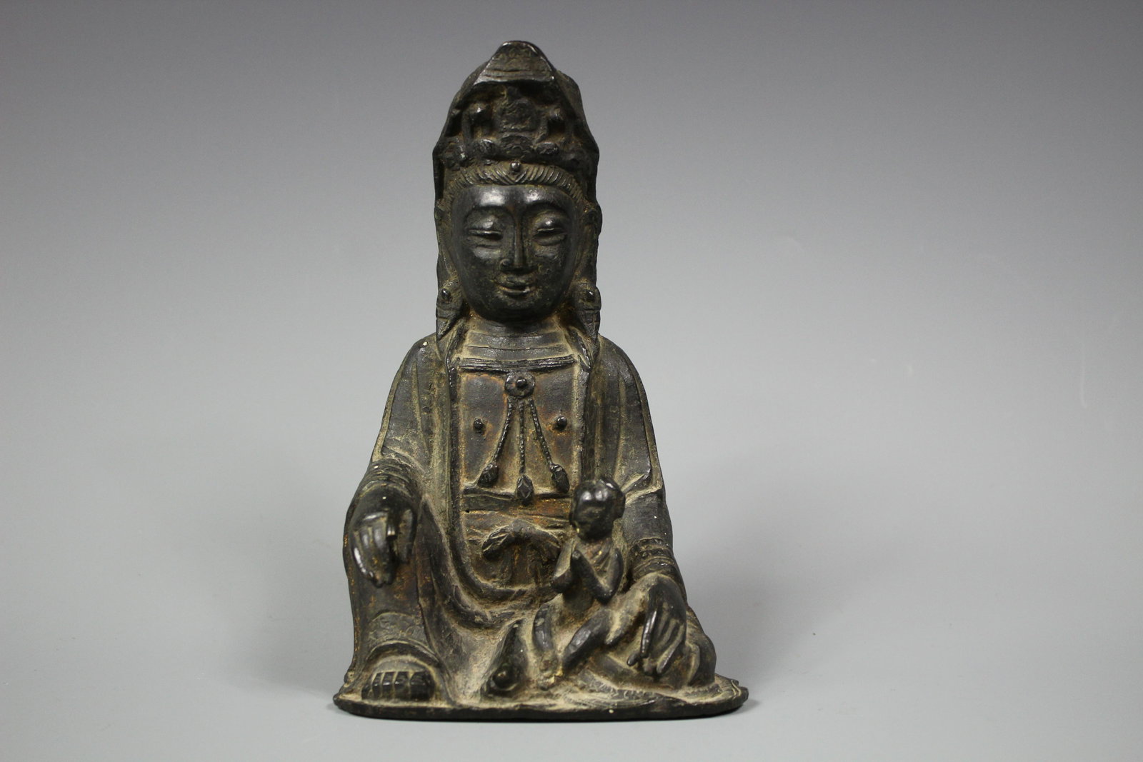 A Bronze Figure of Guanyin Seated, Ming Dynasty: A Bronze Figure of Guanyin Seated, Ming Dynasty 16th/17th Century