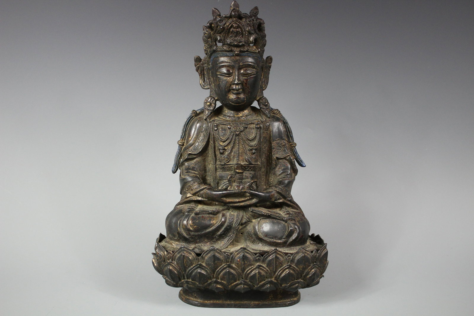 A Parcel-Gilt Bronze Figure of Guanyin, Ming Dynasty: A Parcel-Gilt Bronze Figure of Guanyin, Ming Dynasty 15th/16th Century