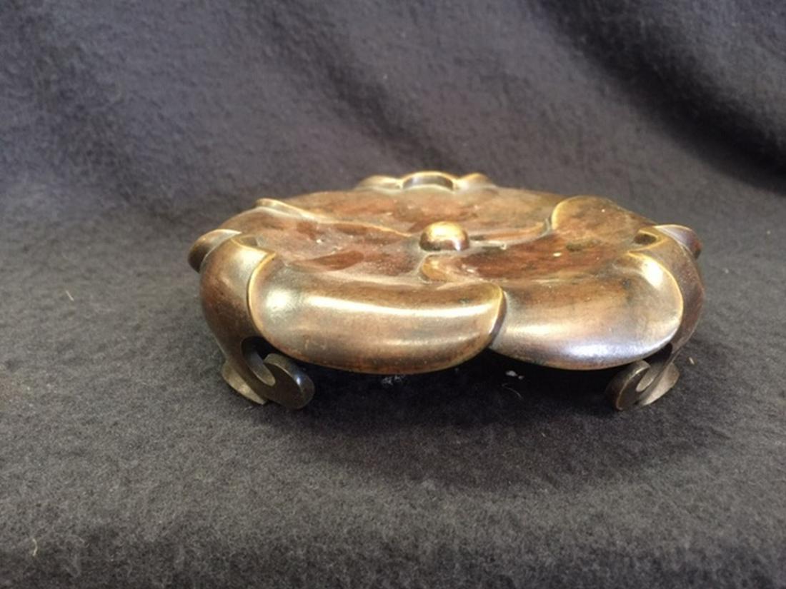 A Bronze Stand, Qing Dynasty: *This is with reserve auction. All property is sold "AS IS". Neither Mei Auctions, nor the seller makes any warranty or representation with respect to the property, and they shall not be responsible f