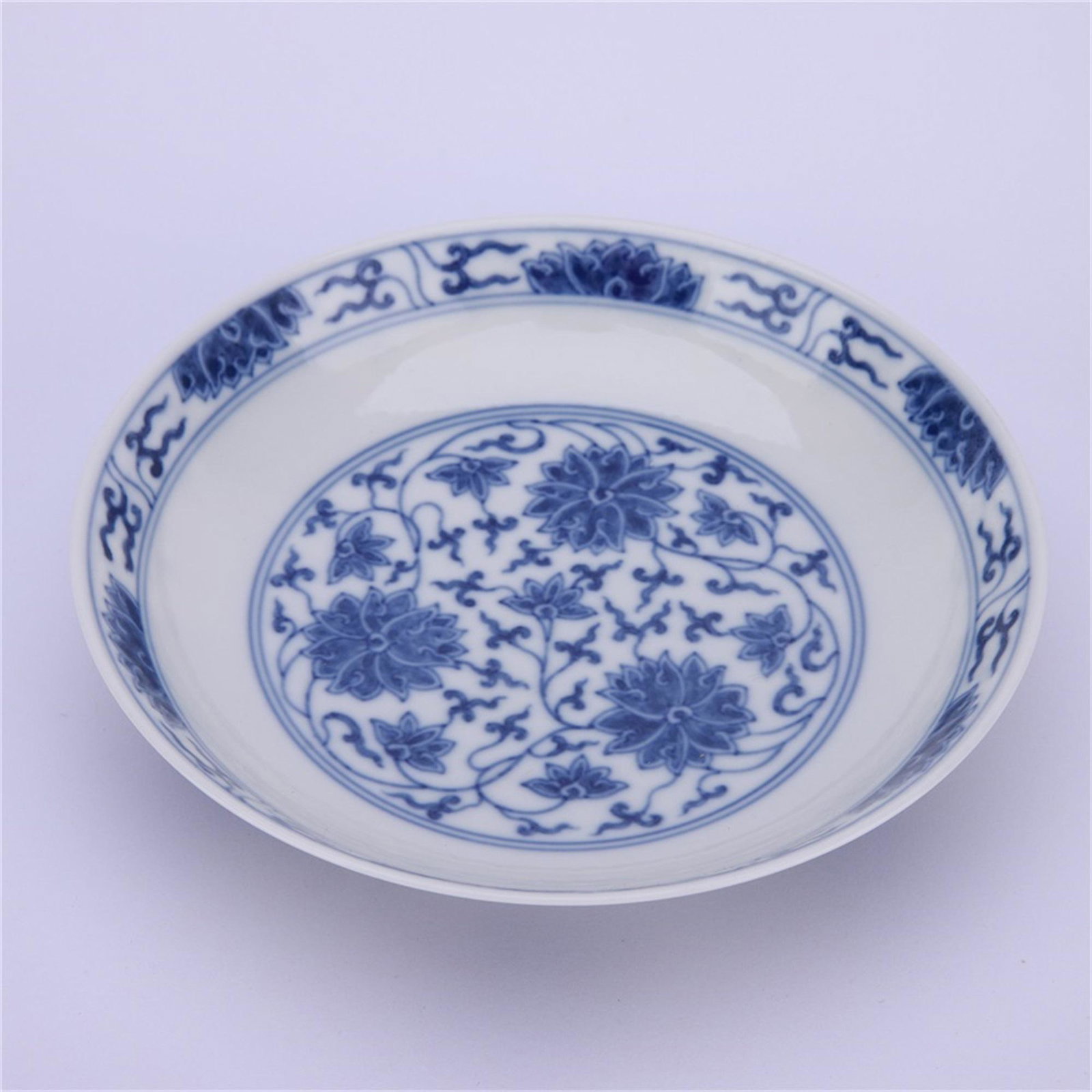 A BLUE & WHITE 'Lotus' DISH. XUANTONG PERIOD, QING DYNASTY. (1 of 5)