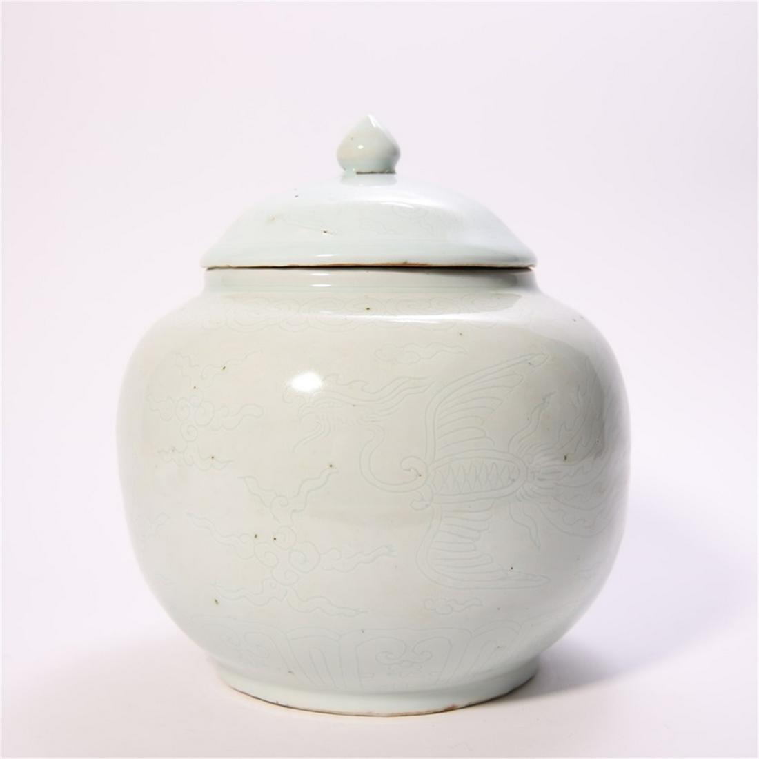 A FINELY INCISED ' Phoenix' CELADON-GALZED JAR AND COVER.  MING DYNASTY. (1 of 7)