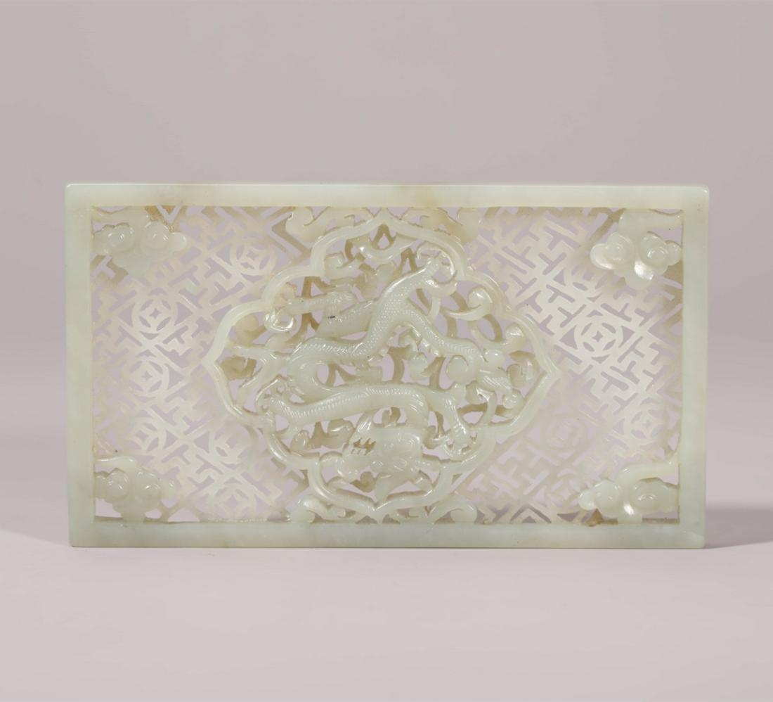 A WHITE JADE CARVING PENDANT. MING DYNASTY. (1 of 6)