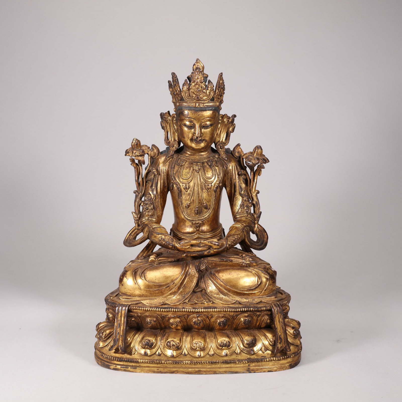 A GILT-BRONZE FIGURE OF VAJRASATTVA. KANGXI PERIOD, QING DYNASTY. (1 of 10)