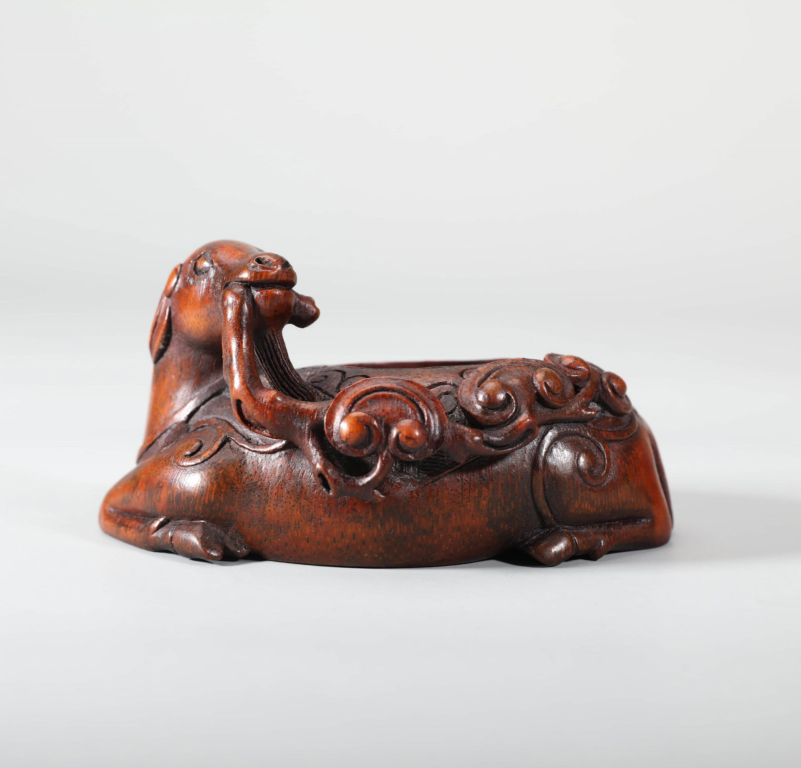A FINELY CARVED BAMBOO 'Mythical Beast' ORNAMENT. QING DYNASTY. (1 of 10)