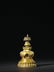 A GILT-BRONZE STUPA