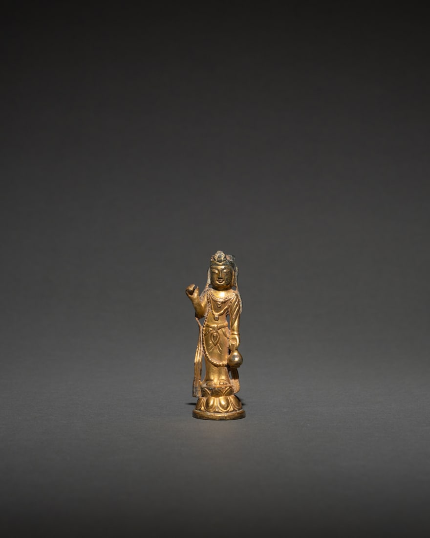 A GILT-BRONZE FIGURE OF GUANYIN: 品名：統一新羅 銅鎏金淨瓶觀音。Age(年代): UNIFIED SILLA, CIRCA 8TH CENTURY。尺寸
