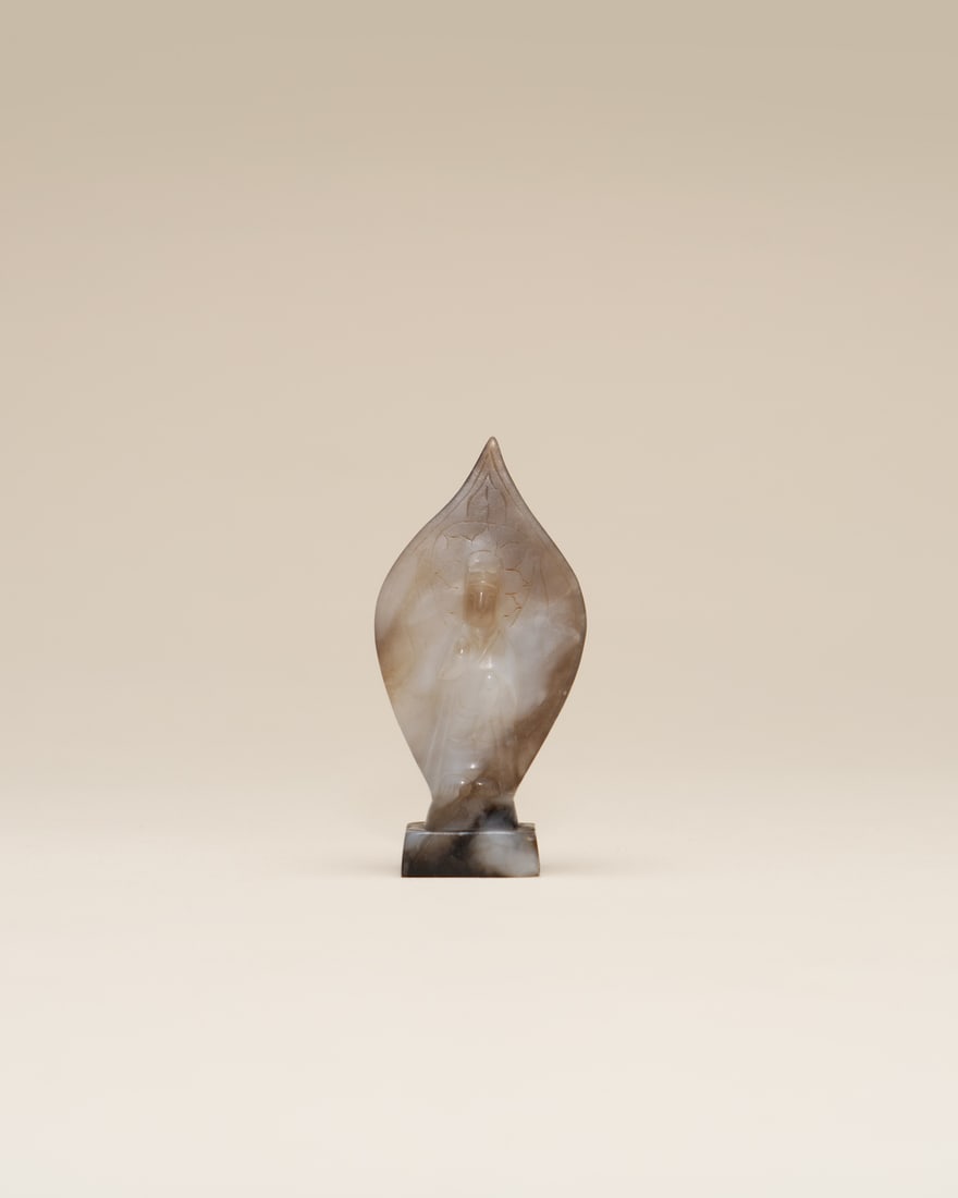 A JADE FIGURE OF BUDDHA (1 of 1)