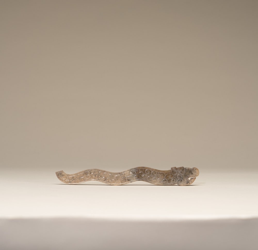 A JADE 'DRAGON' PENDANT (1 of 2)