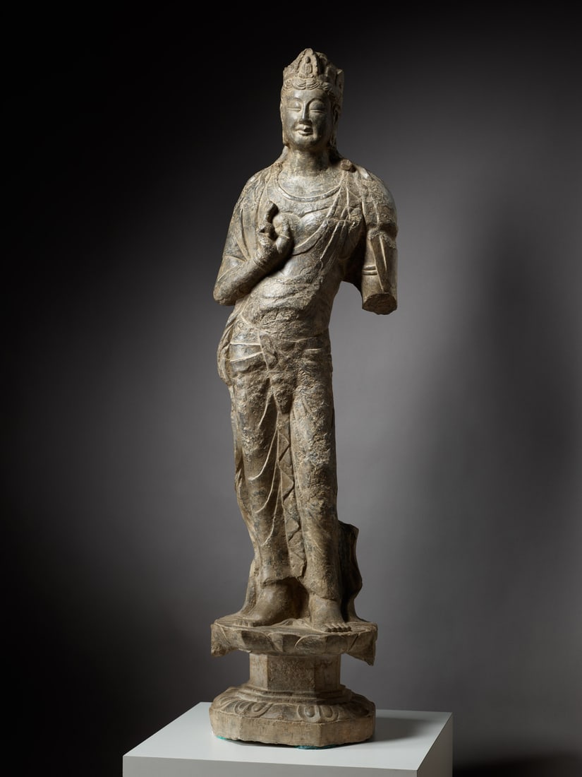A CARVED STONE FIGURE OF BODHISATTVA (1 of 2)