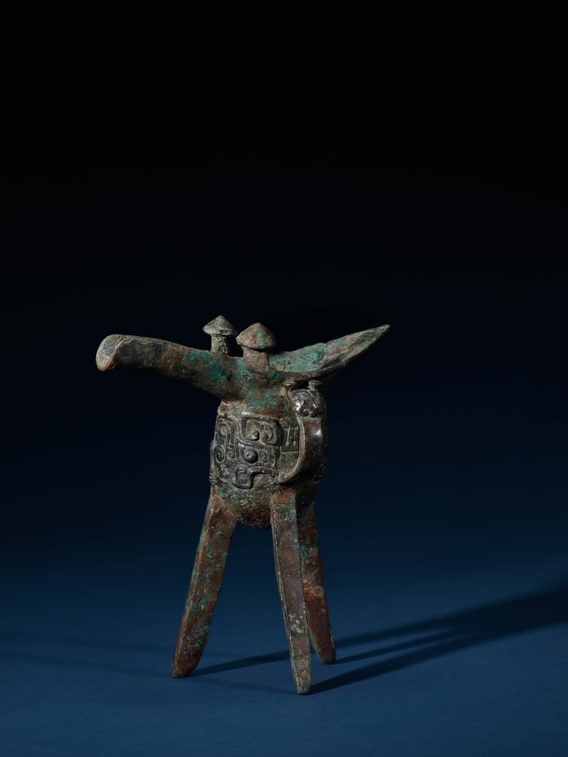 A BRONZE RITUAL WINE VESSEL, JUE (1 of 4)