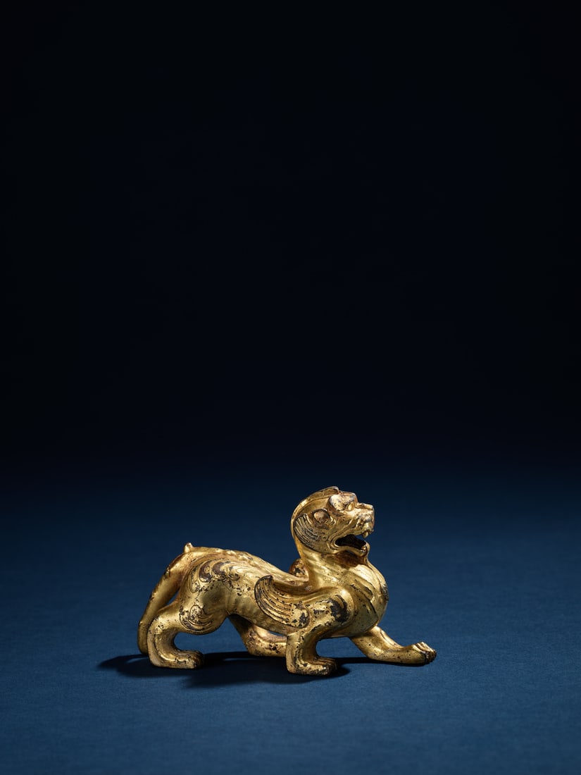 A GILT-BRONZE FIGURE OF BIXIE (1 of 1)