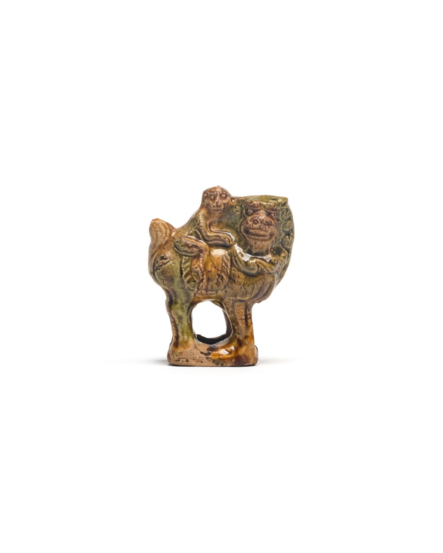 A SANCAI-GLAZED FIGURE OF A MONKEY AND A LION (1 of 4)