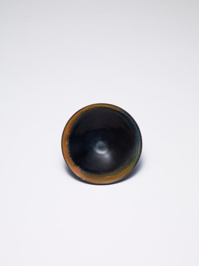 A 'DING' BLACK-GLAZED TEA CUP (1 of 1)