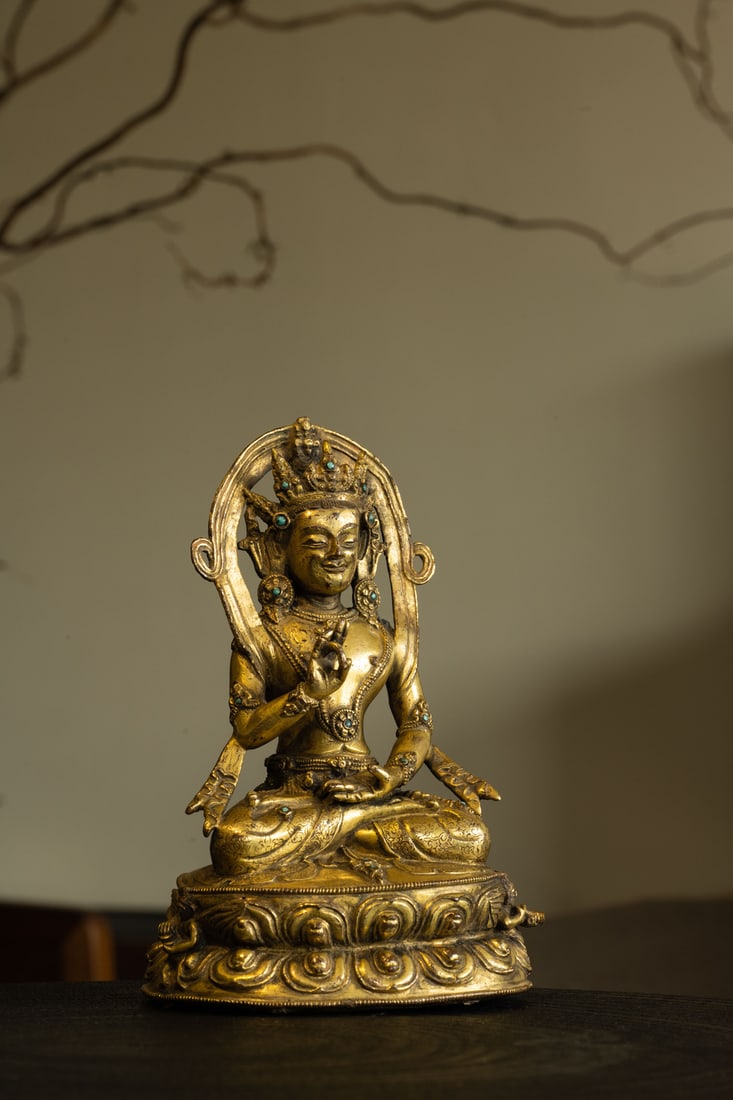 A GILT-BRONZE FIGURE OF AMOGHASIDDHI BUDDHA: 品名(title):元或明 銅鎏金不空成就佛像。年代(Age): YUAN OR MING。 尺寸:18 cm Heig