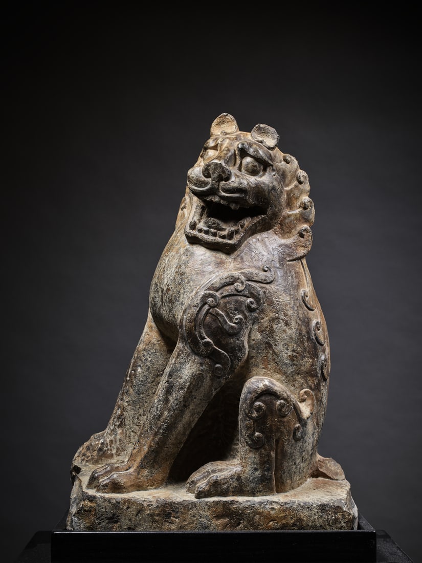 A GREY LIMESTONE FIGURE OF A LION (1 of 1)