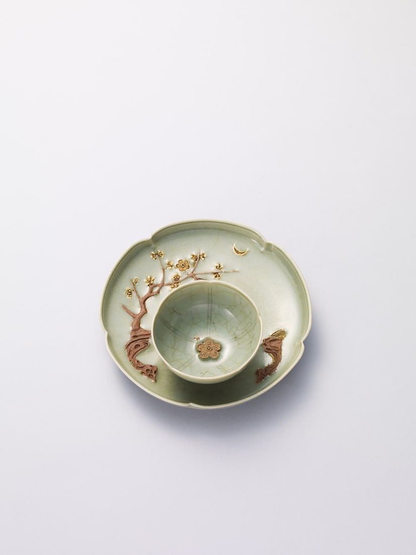 A 'LONGQUAN' CELADON-GLAZED 'PLUM BLOSSOMS' CUP AND STAND (1 of 1)