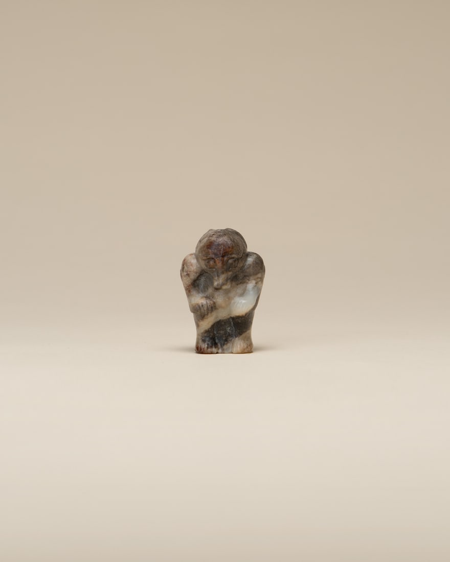 A JADE 'MYTHICAL BEAST' BEAD (1 of 2)