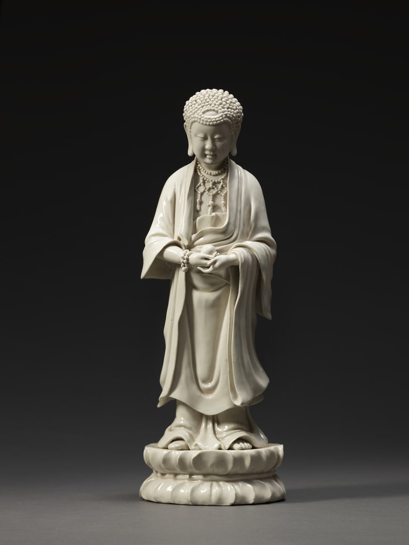 A 'DEHUA' WHITE-GLAZED FIGURE OF BUDDHA: 品名(title):清早期 德化窯佛陀。年代(Age): EARLY QING。 尺寸:35.9 cm Height。 來源ʍ