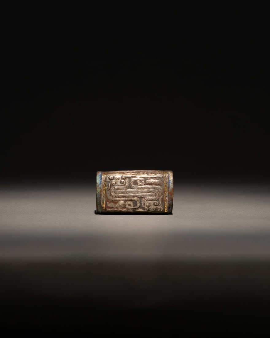 A GOLD AND SILVER-INLAID BRONZE CONG-FORM ORNAMENT (1 of 2)