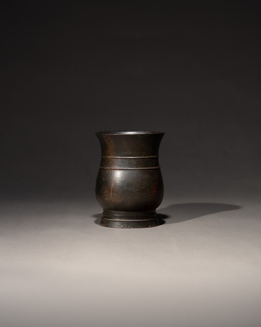 AN ARCHAISTIC BRONZE VESSEL, ZHI (1 of 4)