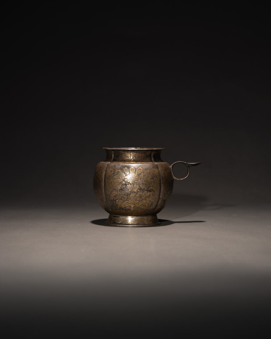 A GILT-SILVER 'FLORAL' HANDLED CUP (1 of 3)