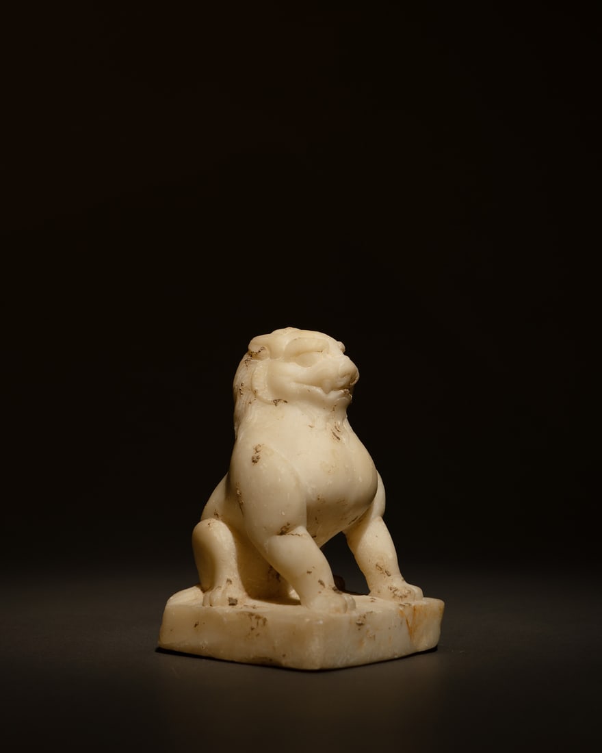 A WHITE MARBLE LION (1 of 2)