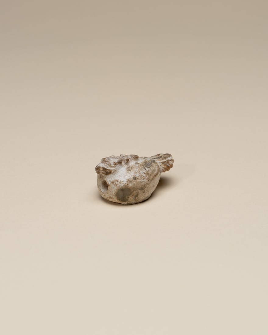 A JADE FIGURE OF AN EAGLE (1 of 2)