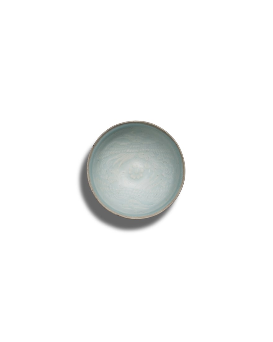 A PAIR OF QINGBAI 'PHOENIX' BOWLS (1 of 6)
