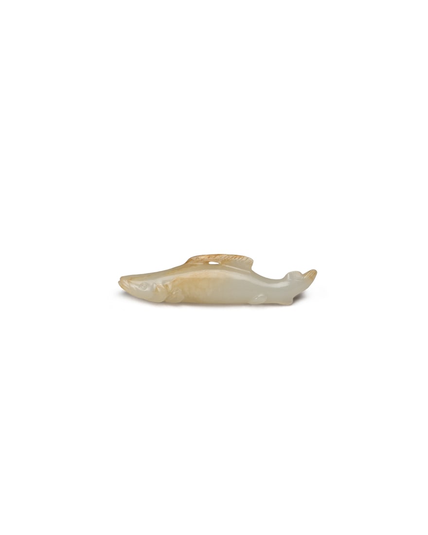 A WHITE JADE 'FISH' PENDANT (1 of 2)