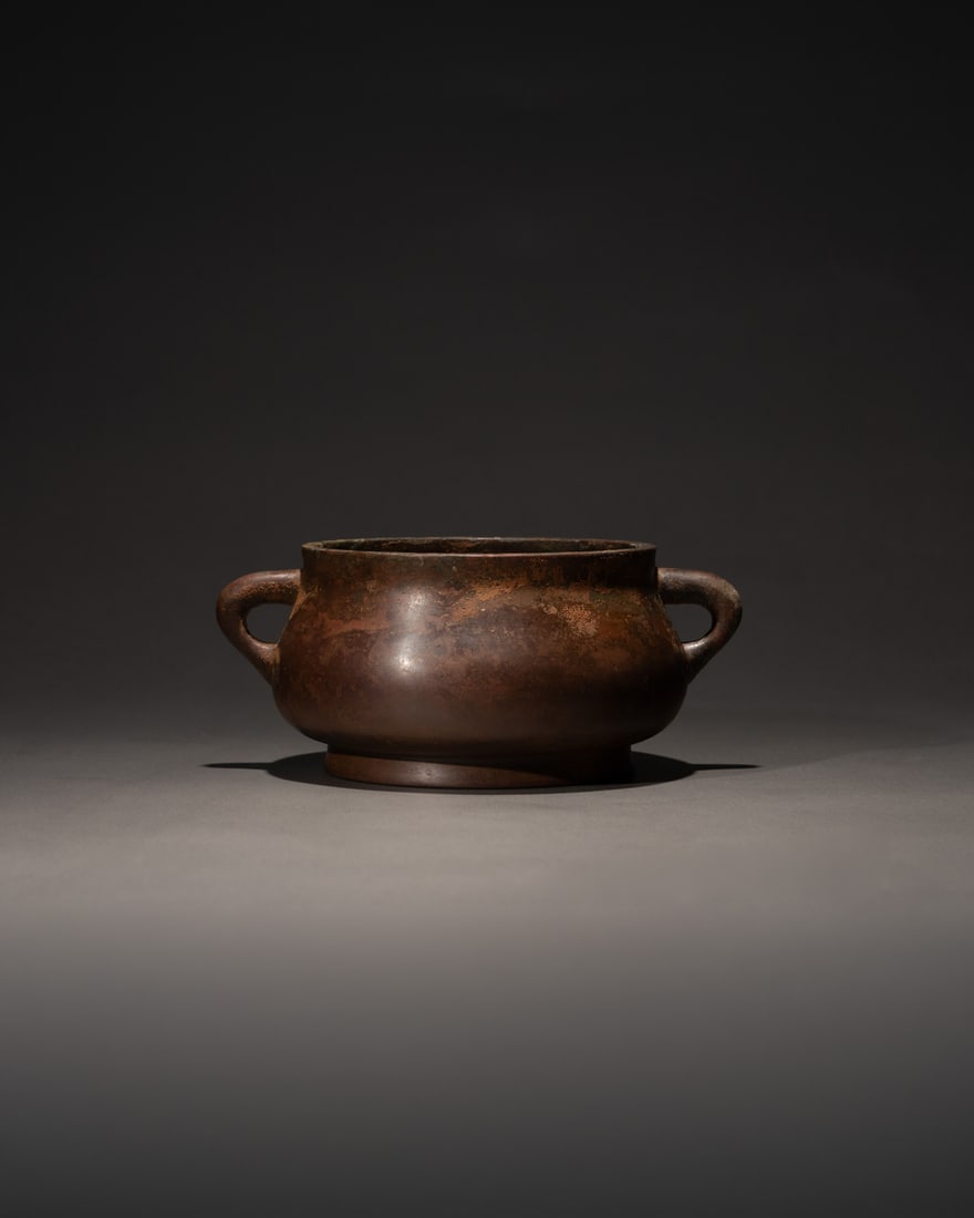 A BRONZE CENSER WITH DRAGON HANDLES (1 of 4)