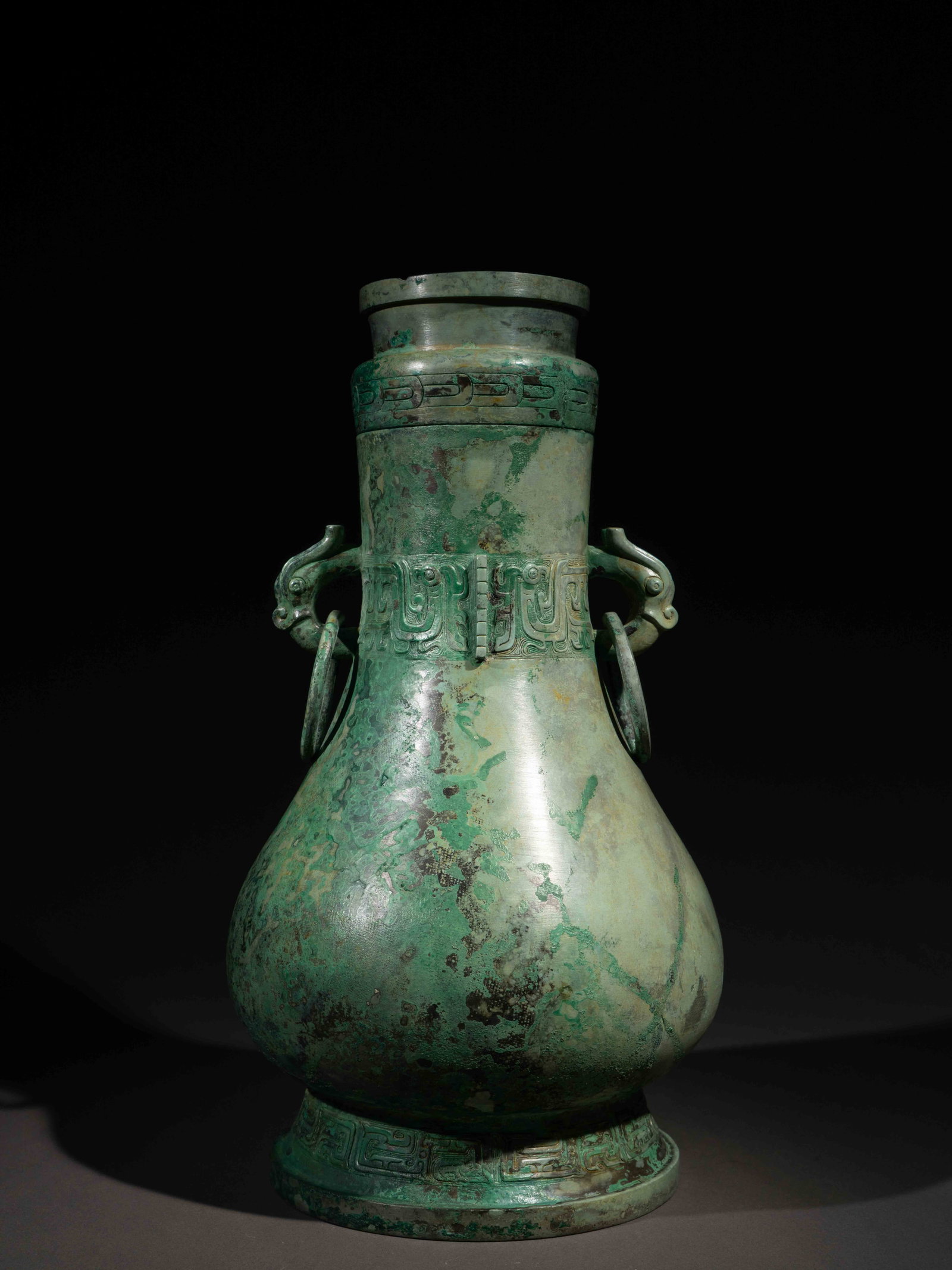 A BRONZE RITUAL WINE VESSEL, HU (1 of 5)