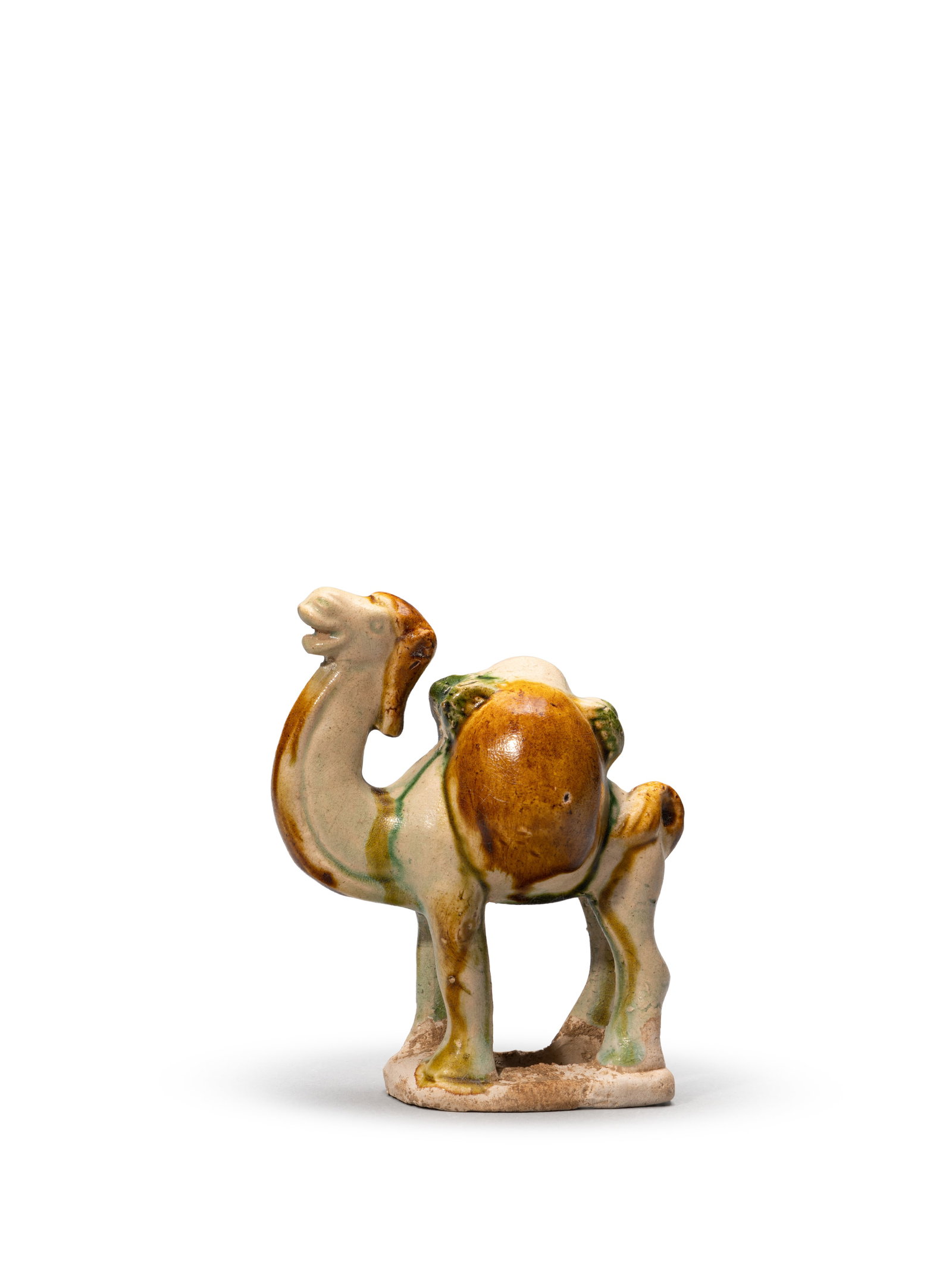 A SANCAI-GLAZED FIGURE OF A CAMEL: 年代(Age):TANG(618-907 A.D.) 。尺寸(Size):11.2 cm Height。