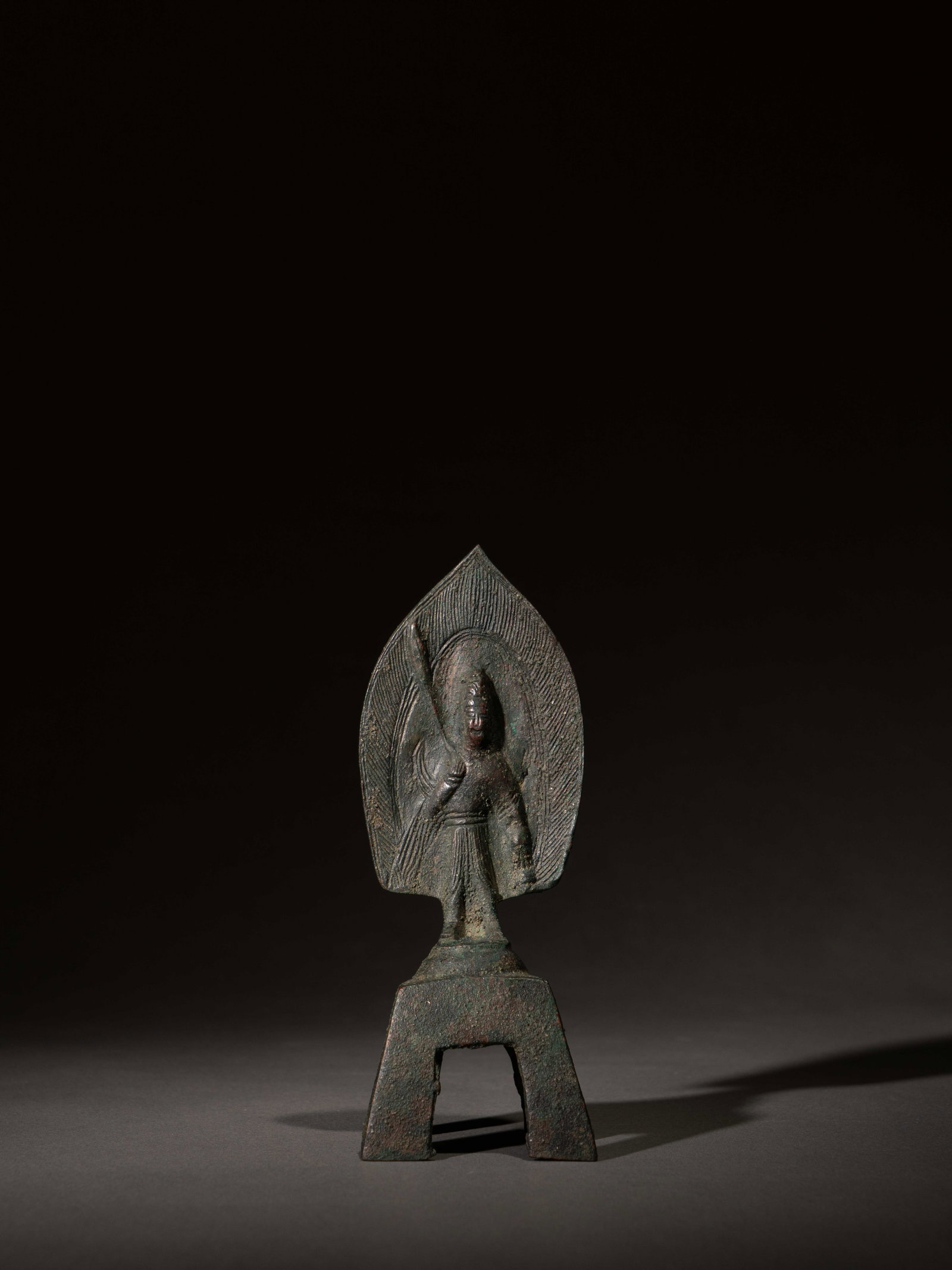 A BRONZE FIGURE OF A BUDDHA (1 of 4)