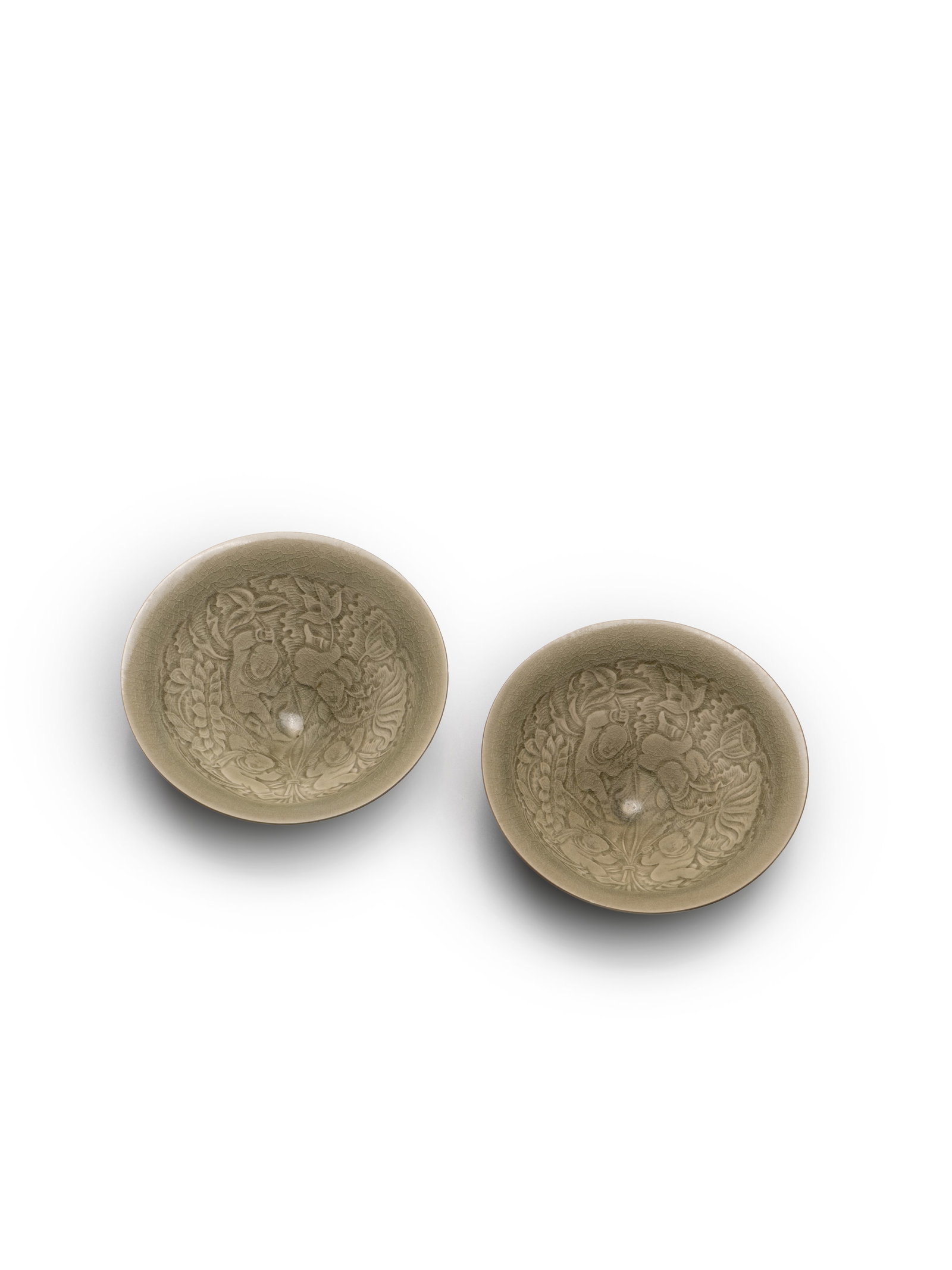 A PAIR OF 'YAOZHOU' 'BOYS' TEA BOWLS (1 of 7)