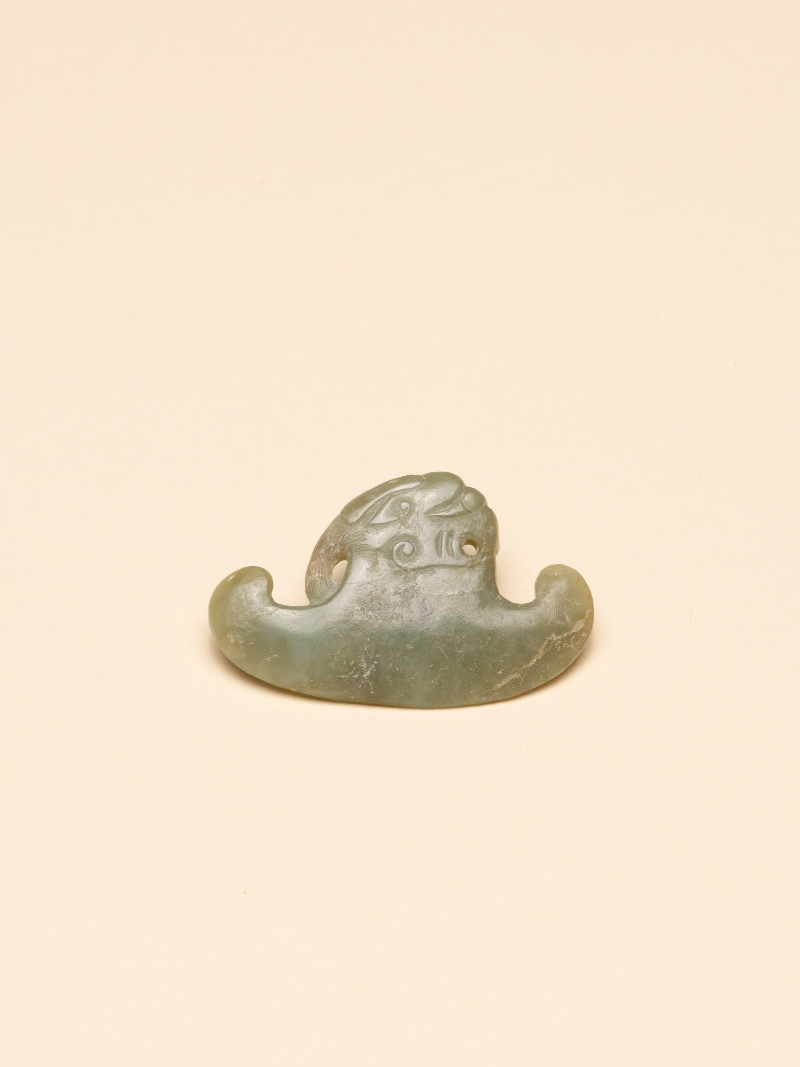 A JADE AXE: 年代(Age):SONG OR YUAN 。尺寸(Size):6.5 cm Width, 3.8 cm Height。