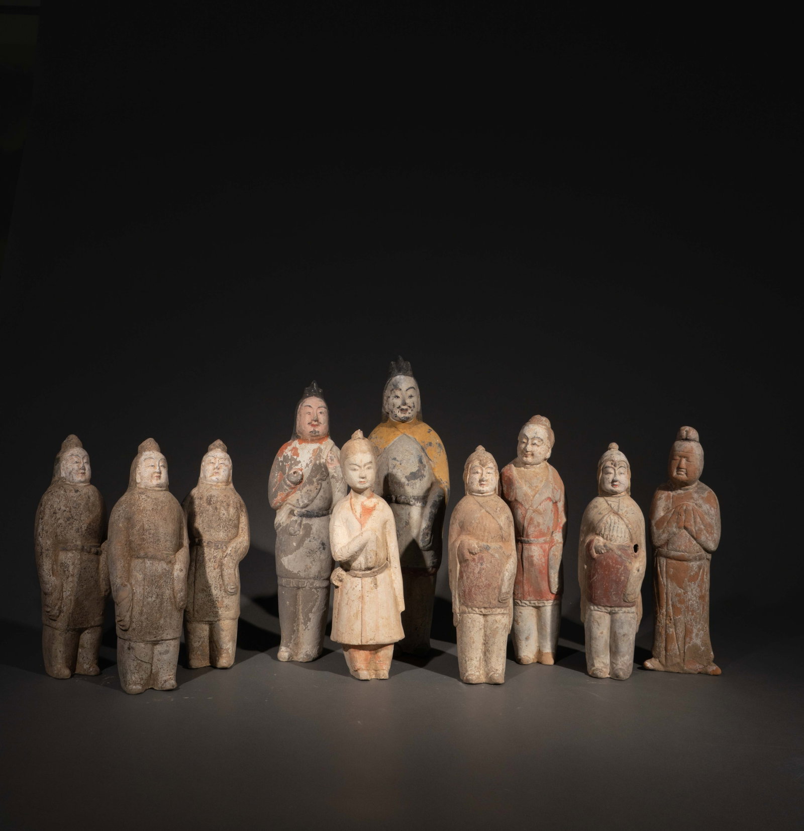 A GROUP OF POTTERY FIGURES (1 of 4)