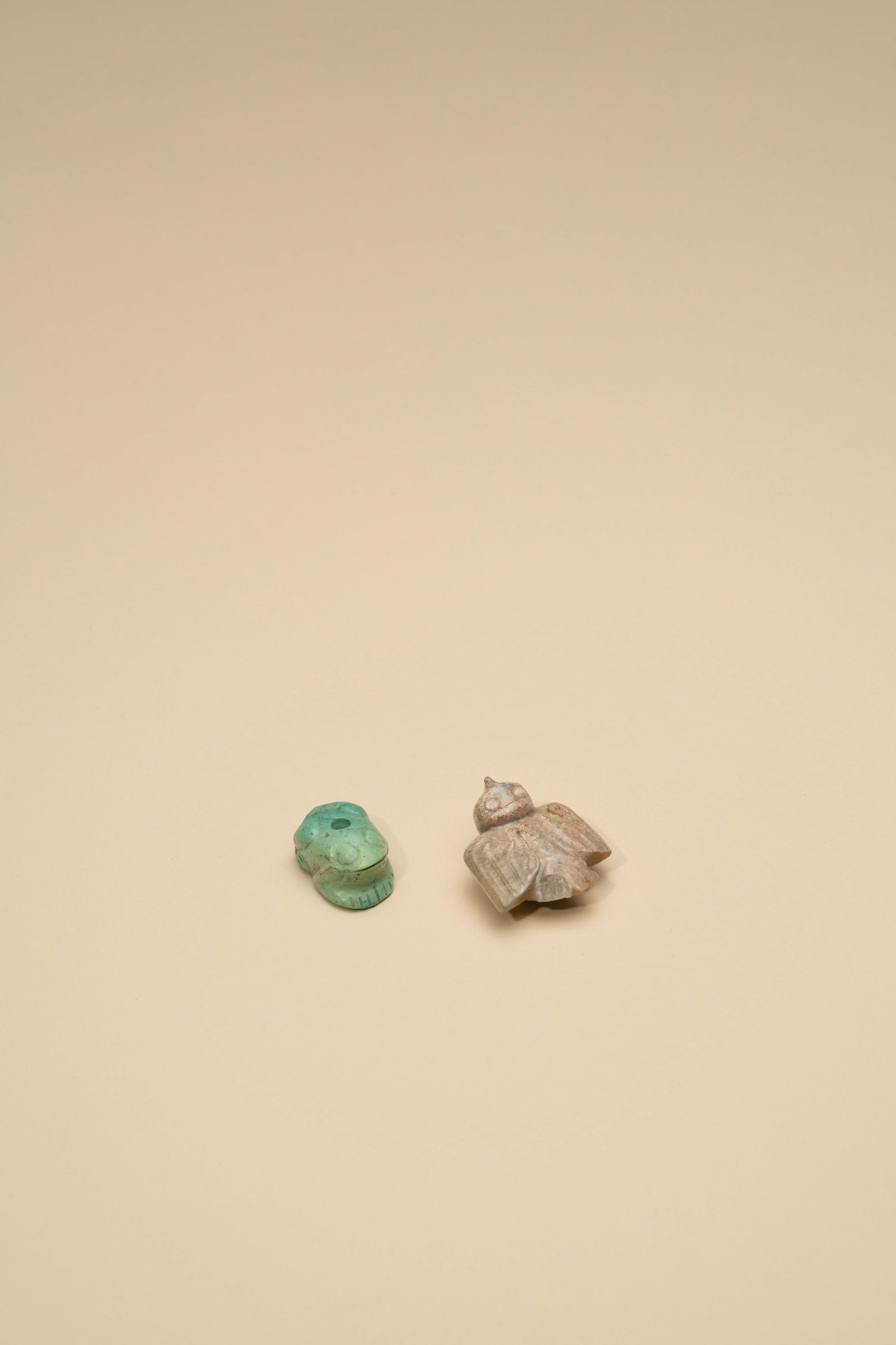 A TURQUOISE FIGURE OF A FROG AND A JADE FIGURE OF A BIRD (1 of 4)