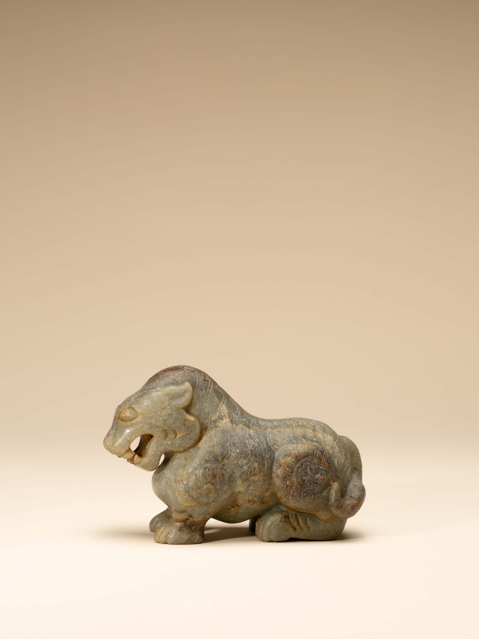 A JADE FIGURE OF A BEAST (1 of 5)