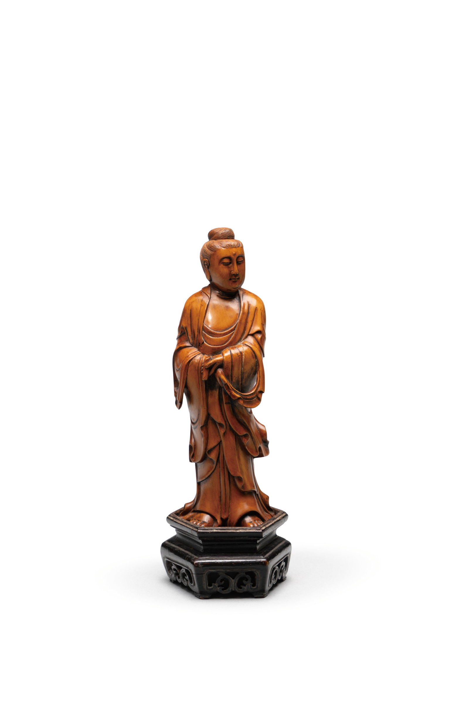 A CARVED FIGURE OF GUANYIN (1 of 4)