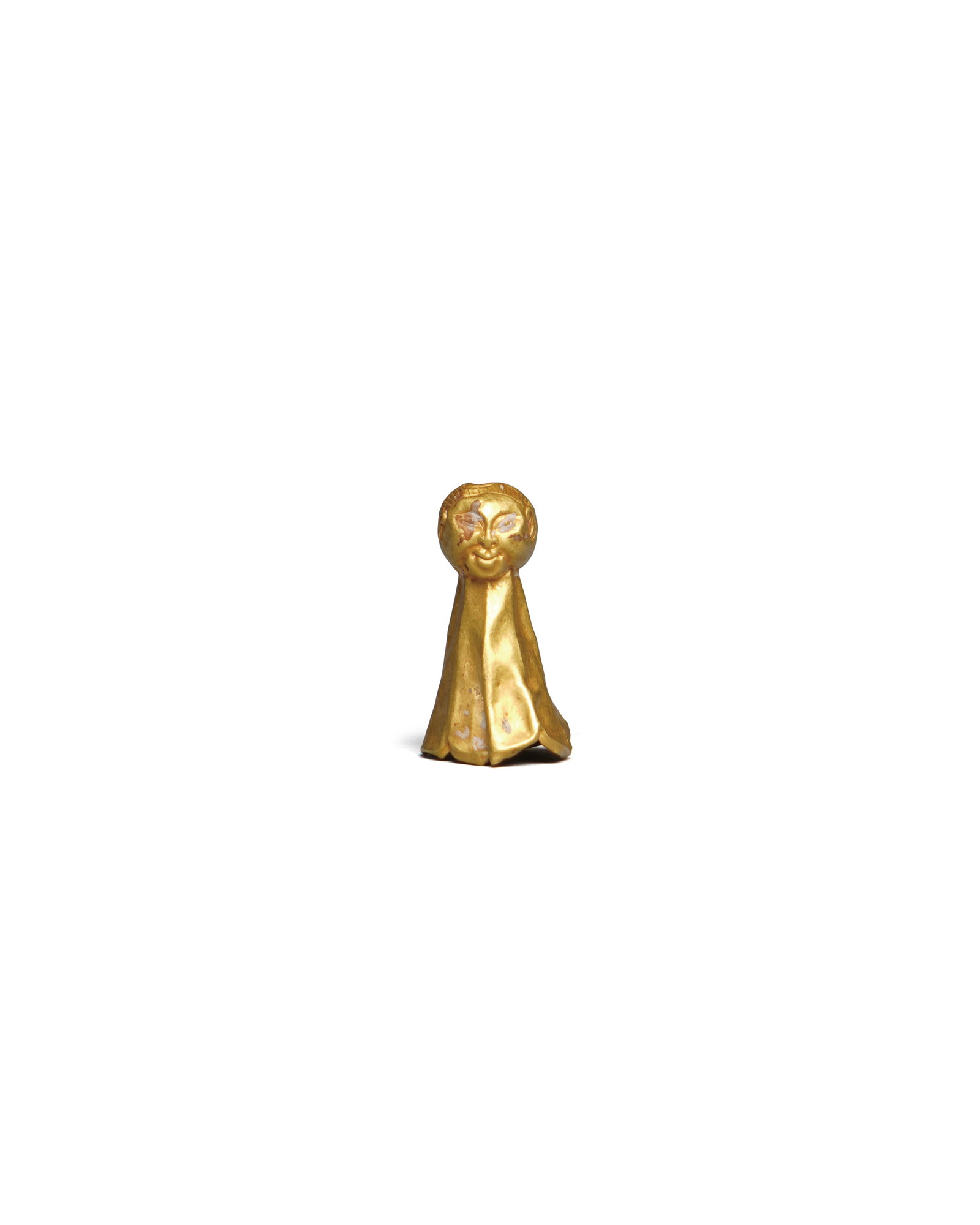 A GOLD TASSEL CAP WITH A HUMAN HEAD (1 of 6)