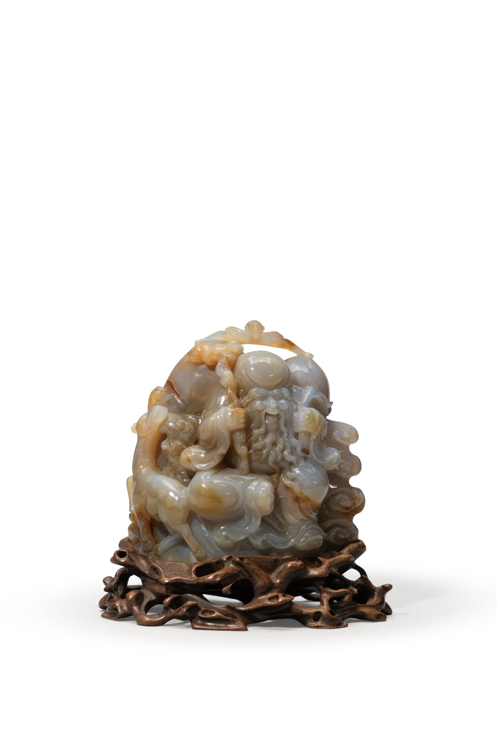 AN AGATE CARVED FIGURE OF AN IMMORTAL (1 of 2)