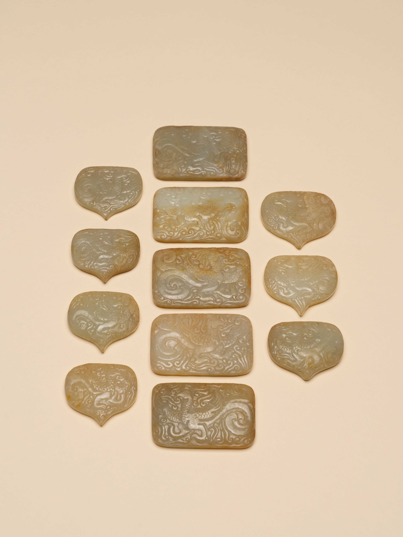 A GROUP OF JADE PLAQUES: 尺寸(Size):Various Sizes (6.7 cm Maximum Width)。