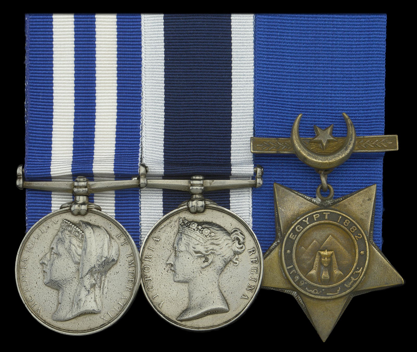 Campaign Groups and Pairs: Three: Sergeant Richard Benson, Royal Marine Artillery Egypt and Sudan 1882-89, dated reverse, no clasp (R. Benson. Corpl. R.M.A. H.M.S. â€œTo.....line”) naming weak in parts from edge bruis