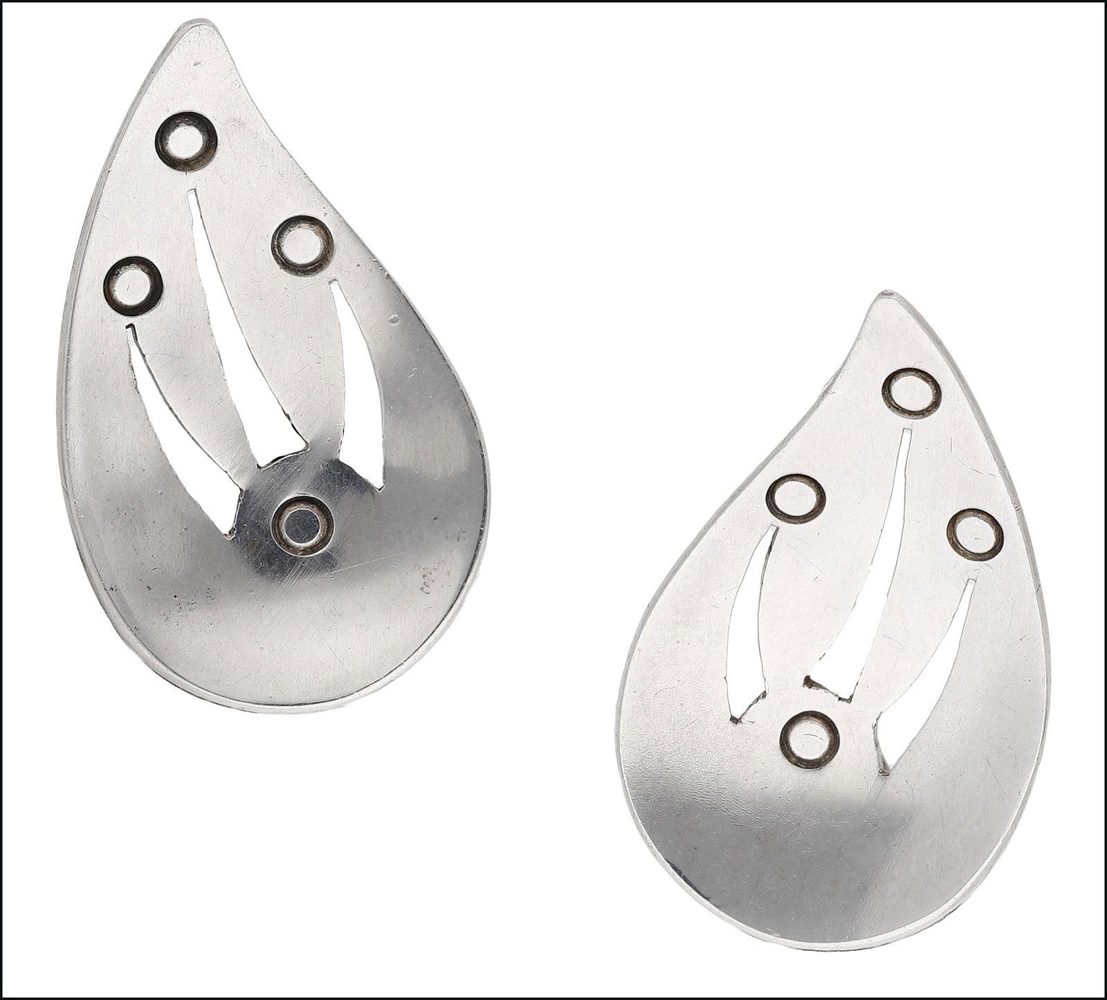 Jewellery: A pair of Swedish silver ear clips by Lennart Haglund, 1957, of stylised and pierced decorated leaf design, screw fittings, maker's mark 'KLH', Swedish and Stockholm assay marks, date stamp G9, length
