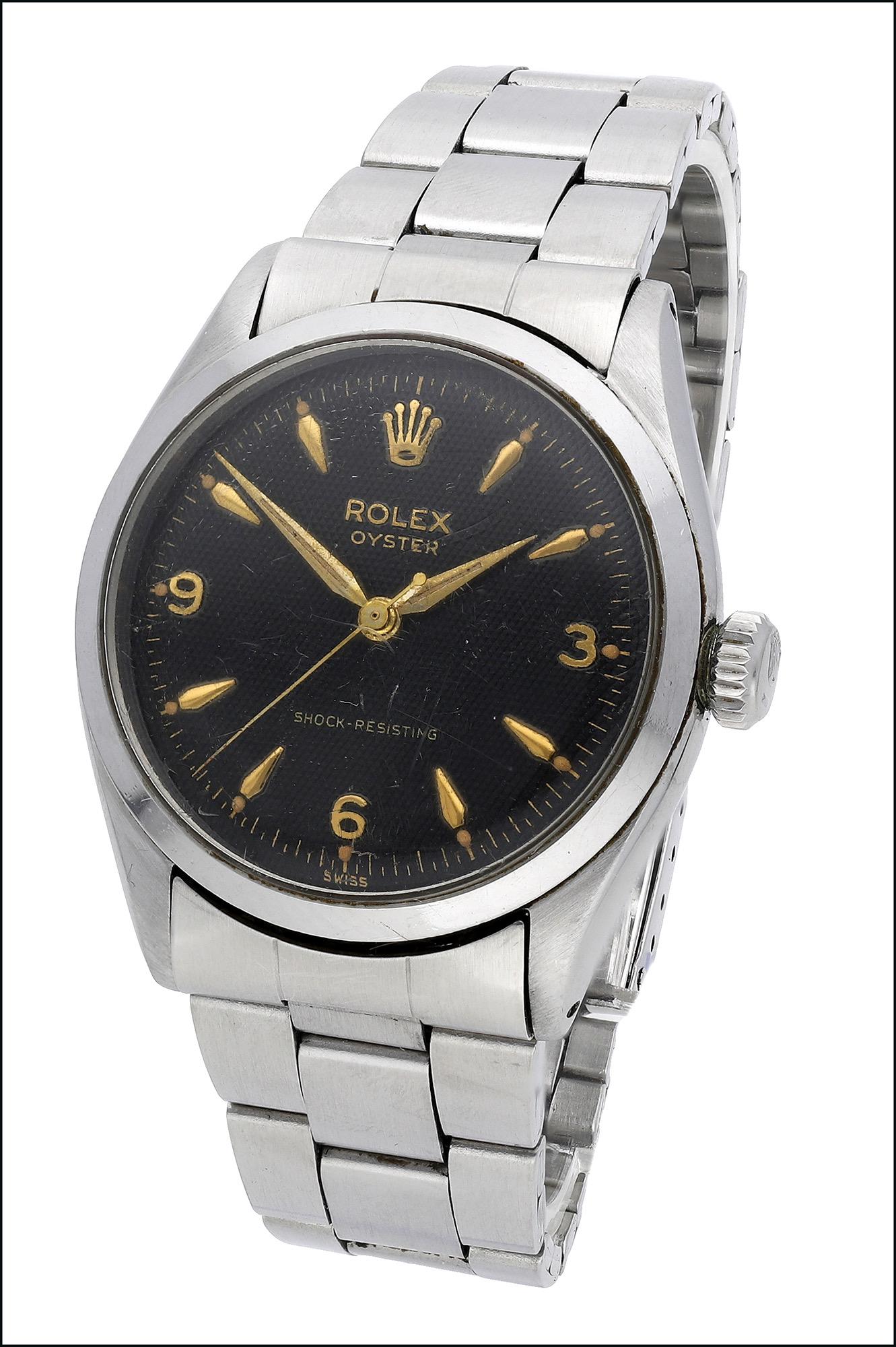 Watches: Rolex. A stainless steel wristwatch with black honeycomb dial, Ref. 6480, Oyster, circa 1957Movement: cal. 1210, manual winding, 17 jewelsDial: black honeycomb, applied Arabic and dagger indexes, cent