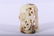 An exceptional white jade 'flower and bird' censer roof