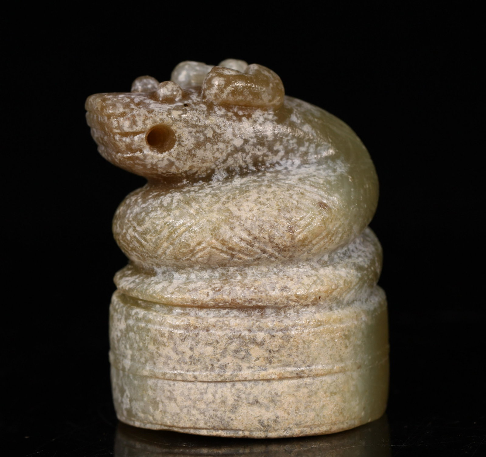 A Rare Carved Jade Seal: A Rare Carved Jade SealChinese Han Dynasty Size:3.3cmX4.8cm
