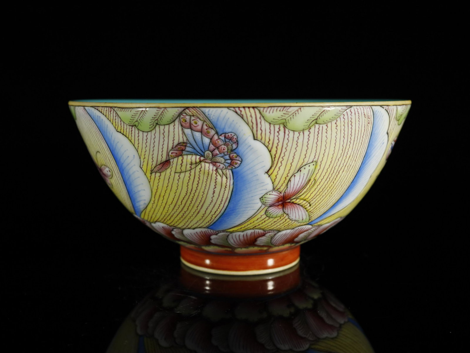A Fine and Rare Famille-rose Flower and Butterfly Bowl: A Fine and Rare Famille-rose Flower and Butterfly Pattern Bowl Chinese Qing Dynasty Mark of Yongzheng Sizeï¼š15cmx7.5cm