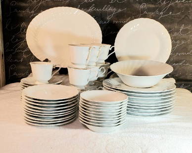 Shelfield Bone White Fine China - Service for 10: Service for 10 includes: Dinner Plates 10 1/2", Dessert Plates 6 3/4", Tea cups and Saucers 6", Serving Bowl 9", Oval Platter 13 1/2"