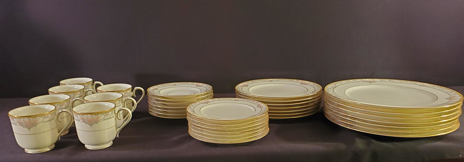 Noritake - Bone China -Japan Barrymore Pattern: Decsribed as Ivory with Gray Band and Pink and White Flowers and is a discontinued pattern that ran 1985-2006. Five Piece setting - Service for Eight.